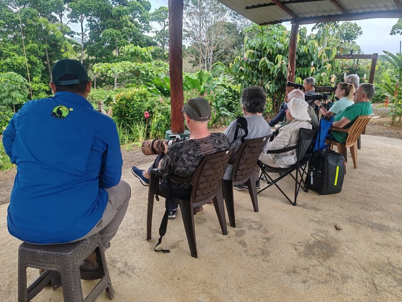 Guests seated in the Boca Tapada photo hide with their guide